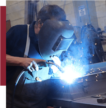 welder welding a hollow metal door